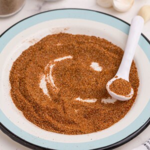 Taco seasoning spread on a plate.