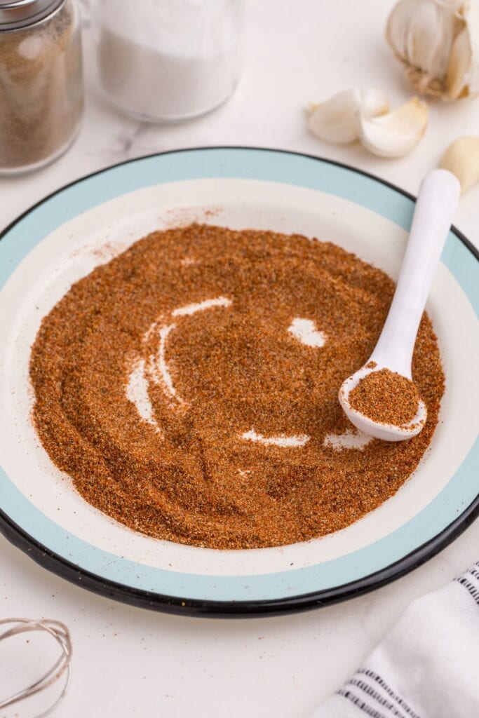 Taco seasoning spread on a plate.