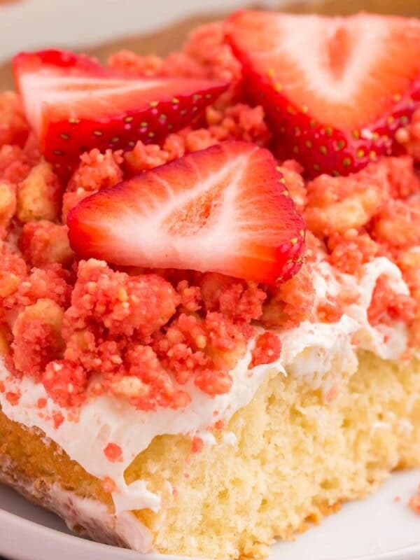 Strawberry shortcake crumble on a white plate.