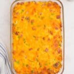 Baked breakfast casserole in a glass dish.