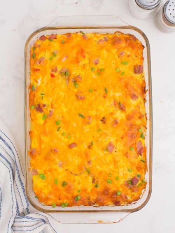 Baked breakfast casserole in a glass dish.