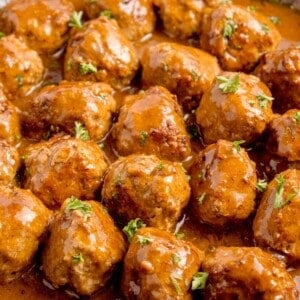 Completed meatballs and gravy recipe in a cast iron pan.