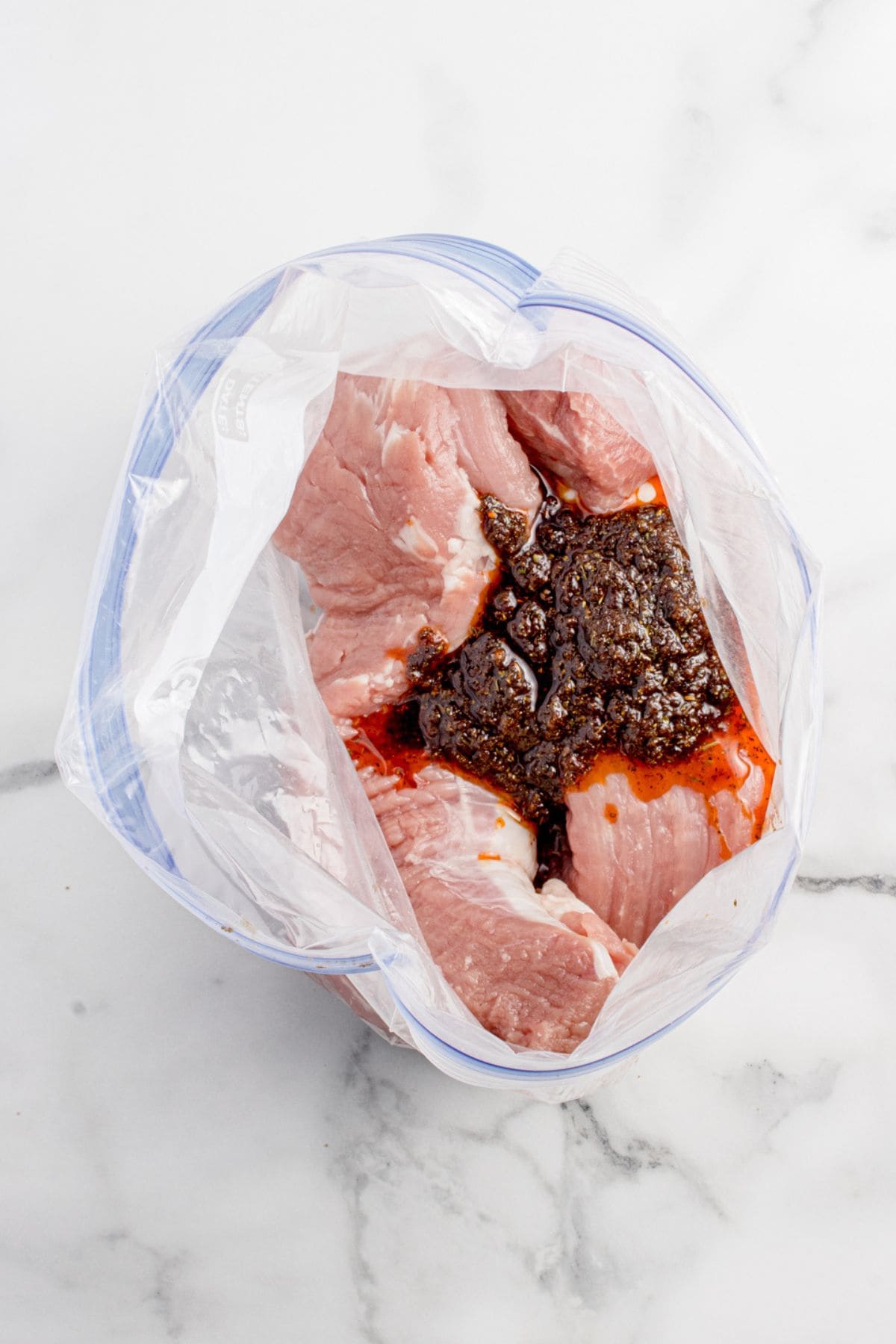 Place pork tenderloins in a zip top bag with the marinade.