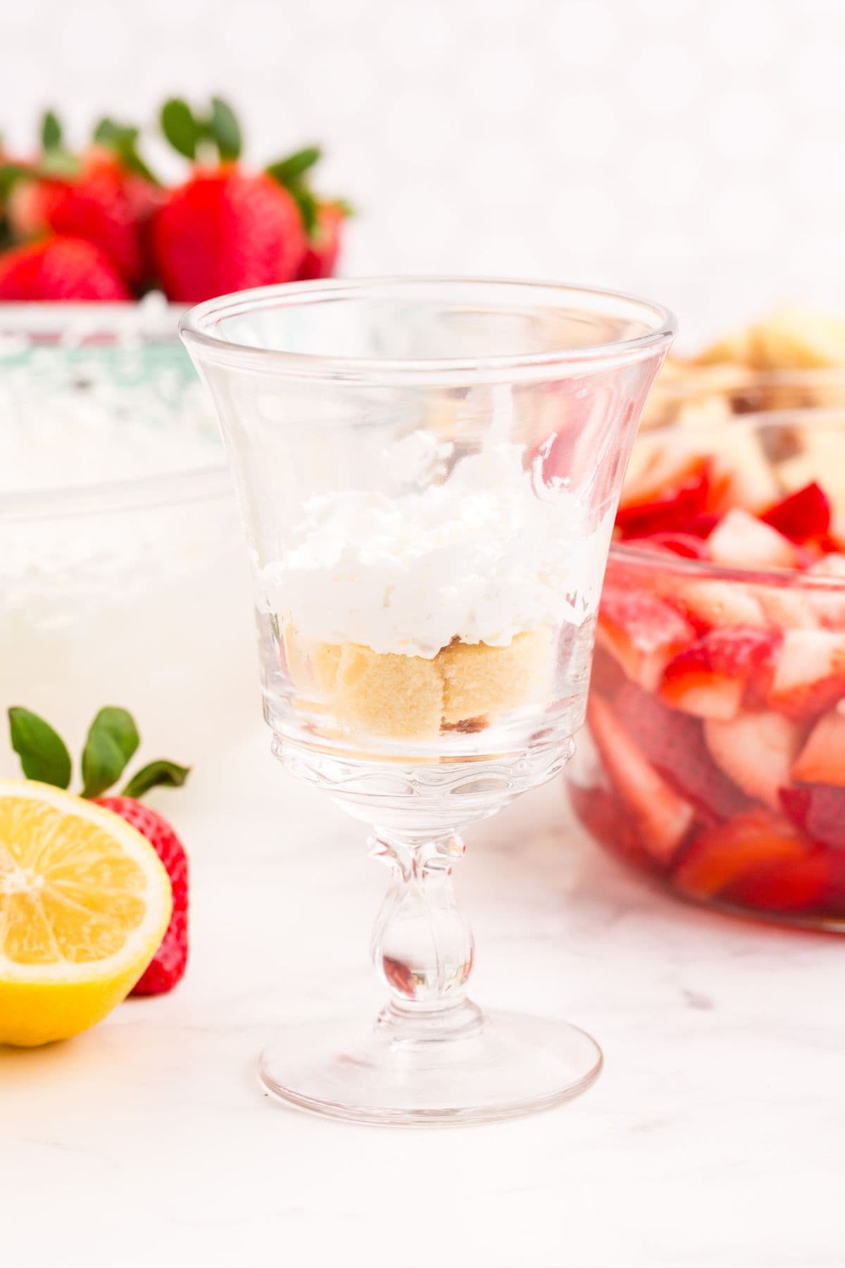 Whipped cream mixture layered on top of pound cake.
