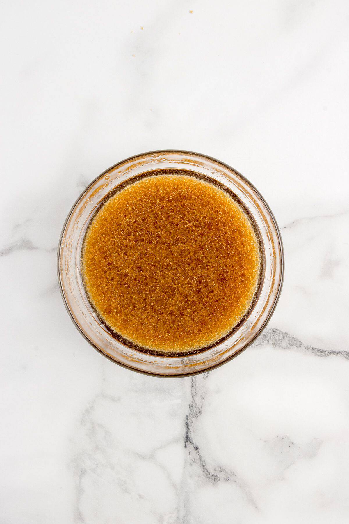 Marinade ingredients combined in a small glass bowl.